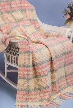 a chair with a blanket on top of it