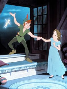 the princess and the frog dance together on stage