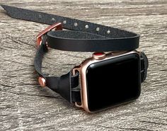 7.3mm Soft High Quality Genuine Leather Bracelet. Designed And Handmade by Simeon D Jewelry Studio. Adjustable Size Double Wrapped Bracelet Tailored to Perfection. This Bracelet Fits ALL Apple Watch Series. Not For Other Models. Apple Watch Is NOT Included. Please Measure Your Wrist Before Submitting Your Order! Follow my Studio on Social Media for Updates & New Designs. Create Your Own Unique Style! Be Different! Be Unique! Make a Fashion Statement Every Place You Go! Get Tons of Compliment Black Adjustable Rectangular Watch Bands, Luxury Black Apple Watch Band For Everyday, Adjustable Black Apple Watch Band, Leather Apple Watch Band As A Gift, Adjustable Watch Bands For Everyday Use, Adjustable Black Watch Accessories As Gift, Adjustable Rose Gold Apple Watch Band For Everyday, Adjustable Black Watch Bands For Everyday, Apple Watch Women