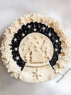 a white plate with black and white decorations on it