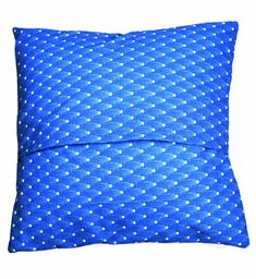 a blue pillow with white stars on it