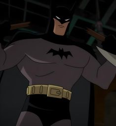 the batman animated character is holding two knives in his hand and wearing a black suit