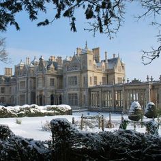 a large building with snow on the ground