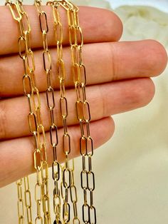 18k Real Gold paperclip Necklace ,24",3 mm, 5.12  gr 18k Real Gold paperclip Necklace ,22",3 mm, 4.69  gr 18k Real Gold paperclip Necklace ,20",3 mm, 4.27  gr 18k Real Gold paperclip Necklace ,18",3 mm, 3.84 gr 18k Real Gold paperclip Necklace ,16",3 mm, 3.41 gr . Priced to sell! Compare our prices to other similar sellers! Arrives in a GIFT BOX and includes FREE SHIPPING within the USA and Canada. International shipping is available at the most economical rates on ETSY. I HAVE BEEN IN THE JEWELRY BUSINESS ALL MY LIFE. I am a second -generation family member making gold and jewelry. Please feel free to ask me any questions - Always happy to help! Fast Replies to messages! Superior Quality and Best Prices! https://www.etsy.com/ca/listing/1094833722/18k-gold-paperclip-necklace18k-paper?click Yellow Gold Paperclip Chain Bracelet As Gift, Yellow Gold Paperclip Bracelet Gift, Gold Paperclip Bracelet With Figaro Chain As Gift, Gold Oval Paperclip Chain Bracelet, Gold Paperclip Chain Bracelet As Gift, Oval Link Paperclip Chain Necklace, Gold Paperclip Chain Bracelet For Gift, Gift Oval Link Paperclip Bracelet With Delicate Chain, Gold Oblong Paperclip Chain Necklace