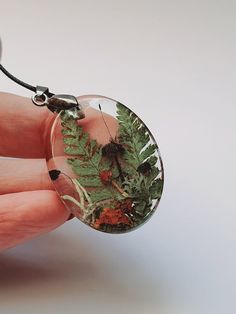 This awesome Real mushroom necklaces sure to be a head turner, a real talking point!  This  Pendant with real dried moss is an uncomplicated way to add a touch of Nature to your favorite Cosplay or everyday attire.  Miniature forest necklace  perfect for  lovers, Nature enthusiasts or just someone with a more individual style.  This pendant is made from a  epoxy resin, dried moss and mushroom The size 30*40 mm Necklace length 50 cm -------------------------------------------------- ------------- Nature-inspired Healing Necklace With Round Pendant, Unique Green Necklace With Natural Inclusions, Nature-inspired Moss Agate Necklace For Healing, Nature-inspired Oval Pendant Necklace For Gifts, Green Necklace With Natural Inclusions For Gift, Green Moss Agate Necklace Nature-inspired, Green Moss Agate Necklace In Nature-inspired Style, Green Moss Agate Nature-inspired Necklace, Green Nature-inspired Necklace