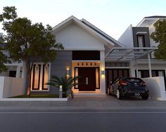 a car is parked in front of a modern house with trees on the side walk