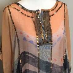 This Stitched Poncho/Tunic From Chico’s Is For Those Who Love The Unusual, Truly Memorable Item Of Clothing. My Ipad Camera Cannot Do It Justice; It Is Gorgeous! The Delicate Fabric Is An Abstract Canvas Of Blues, Oranges, And Purples, Accented On Front And Along Sleeves And Sides With Unique Square Bronze Sequins And Tiny Beads. It Can Go Anywhere; Just Be Ready For Compliments! 100% Polyester, Turn Inside Out To Hand Wash, Lay Flat To Dry. Spring Embellished Tunic, Summer Embellished Tunic, Bohemian Long Sleeve Tunic For Party, Spring Beaded Multicolor Tops, Keyhole Shirt, Asymmetrical Hem Top, Tiny Beads, Navy Blue Shirts, Purple Tank Top