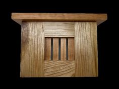 a wooden door with bars on the front and sides, made out of solid wood