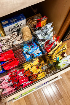 a drawer full of snacks and candy bars