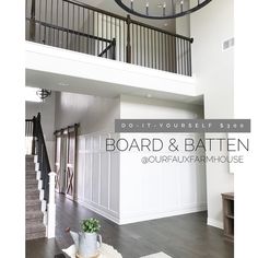 a living room filled with furniture and a chandelier hanging from the top floor