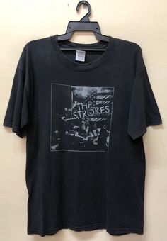 Item :Vintage the strokes live in Canada T-shirt  Armpit to Armpit :23" Length :28" Large  metarials 100%cotton  conditions used vintage  refer to pics carefully made in haiti original / authentic  ACCEPT PAYMENT: PAYPAL ONLY ALL ITEM WILL BE SHIPPED WITHIN 3-5 BUSINESS DAY AFTER RECEIVING CLEARED PAYMENT AND DELIVERED 3-5WEEKS WE ARE USING POST MALAYSIAN WITH YOUR TRACKING NUMBER. PLEASE LEAVE YOUR PHONE NUMBER DURING PURCHASE.PHONE NUMBER REQUIRES FOR MALAYSIAN POST (VERY IMPORTANT) THANKS FOR VIEWING The Strokes Shirt, The Sugarcubes, Jimi Hendrix T Shirt, The Verve, The Strokes, Radiohead, Mens Graphic Tee, Haiti, Oasis