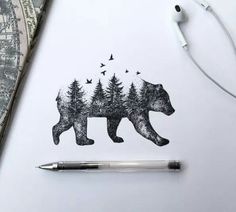 a drawing of a bear with trees and birds on it