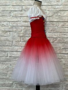 Professional, Russian style, La Fille Mal Gardee Romantic tutu. Deep red jaquard fitted bodice with front laced pattern and white pleated undershirt. Round neck with lace decorations and short chiffon white sleeves with red trims and white lace. V shaped back and closure with hooks and eyes. The front of the bodice is decorated with flower appliques and sparkles. The Romantic tutu skirt has been hand dyed and features gradient shades of red, fading to white. A high level professional tutu, suita White Ruffled Dress For Dance, White Ruffle Dress For Dance, Fitted White Dress With Attached Cancan, Fitted Tulle Dress For Costume, Tulle Dress For Dance, White Tulle Dress For Costume Party, Fitted Tulle Dress For Dance, Fitted Tulle Skirt Dress For Dance, Fitted Tulle Skirt Dress For Costume