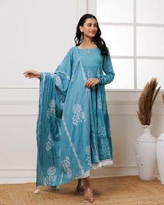 Beat the heat with effortless style in our Light Blue Hand Block Printed Anarkali Set. Made with the finest mul-mul fabric, this suit set is perfect for making a fashion statement even in soaring temperatures. Stay cool and chic even in heat. No. of pieces - 3 piece set. Color - Light Blue. Fabric - Mul-Mul. Washing Instructions - Dry Clean. Indigo Straight Kurta Sets With Dabka Detail, Indigo Straight Kurta Set With Dabka, Indigo Dabka Straight Kurta Sets, Indigo Cotton Sets With Dabka Detailing, Blue Anarkali Set With Printed Motifs, Indigo Straight Kurta Set For Eid, Blue Semi-stitched Unstitched Suit In Mulmul, Blue Block Print Mulmul Sets, Designer Cotton Maxi Length Sets