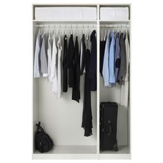 an open white closet with clothes hanging on hangers and a black bag next to it