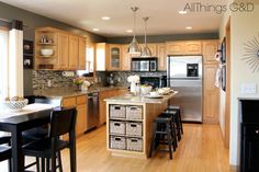 the kitchen is clean and ready to be used for cooking or eating, with many stools around the island