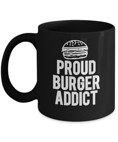 a black coffee mug with the words proud burgerer addictt on it and an image of