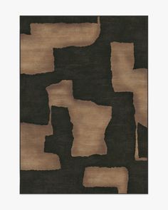 a black and brown rug with different shapes