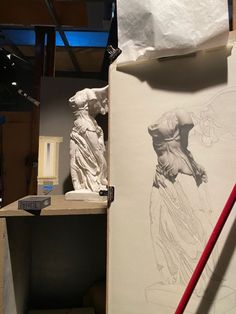 a drawing is being worked on in a studio