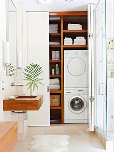 an image of a bathroom with a washer and dryer on the front page