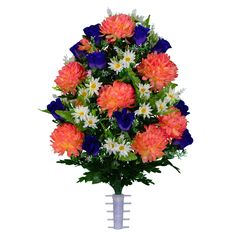 an arrangement of flowers in a vase with blue and orange blooms on the top, against a white background