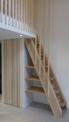 the stairs are made of wood and have no railings