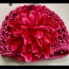 Beautiful Flower Crochet Hat. Handmade Pink Yarn Mini Hats, Pink Hand Knitted Mini Hat, Handmade Adjustable Crochet Hat With Flower Shape, Cute Adjustable Yarn Mini Hats, Handmade Adjustable Crochet Flower Hat, Handmade Adjustable Flower Crochet Hat, Cute Adjustable Crochet Beanie Hat, Pink Beanie Mini Hat For Spring, Adjustable Pink Crochet Hat