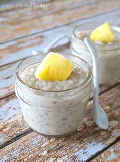 two small jars filled with oatmeal and topped with a lemon wedge