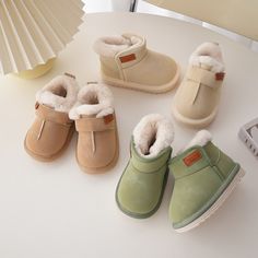 These baby winter snow boots for girls and boys are designed to keep their little feet warm and cozy during the cold winter months. They feature a candy-colored suede upper and a thick fur lining for added warmth. The high-top design provides extra protection against the cold, and the boots are easy to slip on and off with a simple closure. These boots are perfect for toddlers and are a great addition to any winter outfit.Product Details Baby Boy Winter Outfits, Baby Snow, Boots For Girls, Baby In Snow, Romper Designs, Girls Snow Boots, Snow Girl, Baby Boy Clothing Sets, High Top Boots