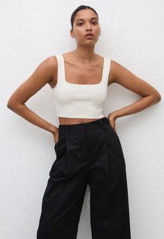 Single pleated chinos with a wide, straight leg and a 90s inspired high waist. A slightly more refined shape made in an organic cotton-blend twill for everyday ease, with side and back pockets. These chinos work well with any of our shirts or tanks for a classic yet easy look, and are always perfectly paired with a sandal. 90s Silhouette, Elastic Skirt, 90s Inspired, Shop Swimwear, Swimwear Tops, Crop Tank, Square Neck, Shopping Outfit, High Waist