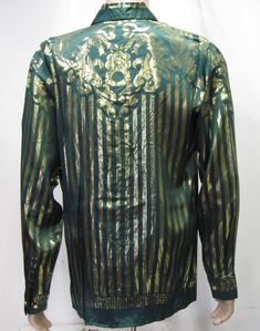 "GREEK STYLE SILK SHIRT GREEN European Style Dress Beautiful 100% Metallic Silk Shirt , Green and Gold all over .Beautiful design . Hidden Gold Finish Buttons Men's Sizes : Medium and Large Comfort Fit with Beautiful details all over Excellent condition Please see measurement for proper fitting or compare to one shirt that fit you good Unisex Adults TAG SIZE SMALL : Pit to Pit With the shirt lying flat : 22\" inches, Sleeve Length, measured from the top of the shoulder seam to the end of the arm Green Formal Shirt For Fall, Formal Green Shirt For Fall, Festive Vintage Long Sleeve Blouse, Festive Green Long Sleeve Top, Fitted Green Festive Top, Casual Green Shirt For Party, Fitted Green Top For Festive Occasions, Vintage Green Fitted Shirt, Vintage Fitted Green Shirt