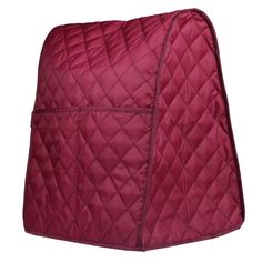 a red quilted blanket on a white background