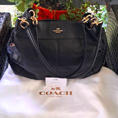 This New Beautiful Coach Lexy Black Pebble Leather Shoulder Bag With Gourgous Gold Hardware Adds Elegance To Your Wardrobe For Everyday Or Special Occasions. With 3 Separate Compartments, 1 With Center Zipper Compartment And 2 Magnetic Snaps With Several Pockets And Separate Zipper Compartment Inside. With The Beautiful Double Leather Handles With 10" Drop For Perfect Comfort. Comes With Dust Bag And Coach Care Card. Makes For The Excellent Gift. Retail Price $395 Nwot Coach Pebbled Leather Satchel With Gold-tone Hardware, Luxury Coach Pebbled Leather Shoulder Bag, Coach Pebbled Leather Shoulder Bag With Double Handle, Coach Pebbled Leather Double Handle Shoulder Bag, Pebbled Leather Satchel Shoulder Bag With Branded Hardware, Evening Bags With Branded Hardware And Pebbled Leather, Everyday Pebbled Leather Shoulder Bag With Branded Hardware, Black Pebbled Leather Shoulder Bag With Branded Hardware, Daily Use Pebbled Leather Shoulder Bag With Branded Hardware