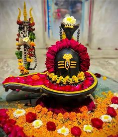 an elaborately decorated table with flowers and decorations