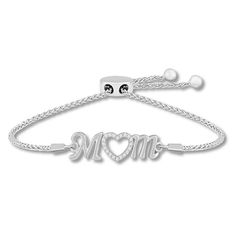 This lovely bolo bracelet for mom features a heart decorated with lab-created white sapphires for shimmer. Crafted of sterling silver, the bracelet has a wheat chain and sliding bolo clasp that allow it to adjust up to 9 inches in length. Adjustable Jewelry For Mother's Day Anniversary, Adjustable Jewelry For Anniversary And Mother's Day, Adjustable Silver Jewelry Gift For Mom, Cubic Zirconia Jewelry For Mom, Adjustable Diamond Jewelry For Valentine's Day, Valentine's Day Adjustable Diamond Jewelry, Adjustable White Gold Jewelry For Mother's Day, Adjustable Bracelet As Gift For Mom, Adjustable White Gold Bracelets For Mother's Day