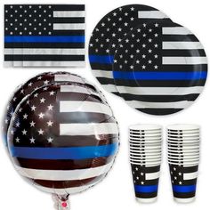 an american flag party set with balloons and plates, including one balloon in the shape of a thin blue line