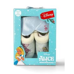 two pairs of disney princess slippers are in a box with snowflakes on them