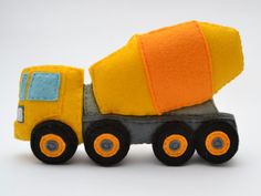 a toy cement truck is shown on a white background with space for the wording