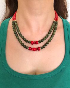 Coral and Jade Natural Stone Multistrand Necklace ✅ NECKLACE FEATURES * Handmade item * Material: 8 mm green jade natural stone, raw red coral gemstone, red miyuki beads, gold plated hematite stones, dorica and chain * Lenght: 43 cm/17 inches and has 5 cm/2 inches  adjustment chain. If you need longer additional extension chain, please inform me. * There may be some color discrepancies, which is due to the different monitor settings. * Please note that, natural stones may be slightly different size, shape and color tones from each other, due to their nature. These small differences make your jewelry so special and unique. ⭐️ This elegant statement double-strand handmade  beaded necklace, designed with raw red coral and green jade gemstones, along with gold-plated hematite and dorica beads, Hematite Stone, Handmade Beaded Necklaces, Jade Necklace, Green Jewelry, Miyuki Beads, Jade Green, Red Coral, Multi Strand Necklace, Multi Strand