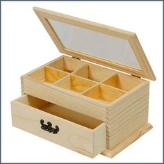 an open wooden box with four compartments on the bottom and one drawer at the top