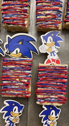 sonic the hedgehog sandwiches are decorated with red, white and blue streamers to look like toothpicks