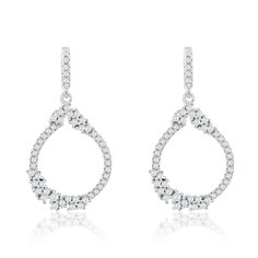 Add the perfect amount of sparkle to your ears with these cluster of cubic zirconias open pear shape drop dangle earrings. These beautiful earrings features prong and pave set white cubic zirconia in an unique cluster design. These earrings will hang on your ears and will create shimmer and shine from every angle. These gemstones are all hand set in 925 sterling silver with a high polish finish. Surprise someone special in your life with these luxurious earrings. The perfect gift that is not onl Luxury Hand Set Cluster Earrings With Cubic Zirconia, Luxury Hand Set Cubic Zirconia Cluster Earrings, Luxury Hand Set White Earrings, Luxury Hand-set Cubic Zirconia Cluster Earrings, Luxury Dangle Earrings With Prong Setting, Luxurious Earrings, Cluster Design, Shimmer And Shine, Luxury Earrings