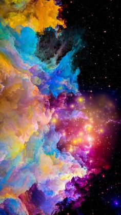 an image of colorful clouds and stars in the night sky with bright colors on them