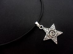 "This is a pretty leather cord 13 - 14\" choker necklace with a tibetan silver star charm." Adjustable Silver Charm Necklaces With Star Charm, Adjustable Star-shaped Nickel-free Necklace, Nickel-free Adjustable Star Necklace, Adjustable Star Choker For Festival, Adjustable Star-shaped Choker For Festivals, Adjustable Star-shaped Choker For Gift, Adjustable Star Shaped Choker As A Gift, Adjustable Star Shaped Choker For Gift, Adjustable Silver Choker With Star Charm