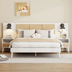 a white bed sitting in a bedroom on top of a hard wood floor next to a lamp