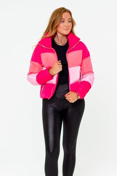 Puffer Jackets don't get more stylish than this! The Addison is the perfect addition to your winter coat collection! She features a zip up and snap closure, a color-block design, and two side pockets! Pair her with leggings, bodysuit, and sneakers for a cute on-the-go look! Product Details: Fit: The Addison Jacket fits true to size. Length: The small measures 23.5" from shoulder to hem. Bust: Accommodating to most bust sizes. Waist: Relaxed fit Fabric: ﻿Fabric does not contain stretch. Material: Spring Nylon Outerwear With Patchwork, Winter Sporty Outerwear With Zipper Closure, Sporty Winter Outerwear With Zipper Closure, Pink Nylon Winter Outerwear, Winter Nylon Pink Outerwear, Pink Nylon Puffer Jacket For Spring, Pink Quilted Puffer Jacket For Fall, Trendy Pink Patchwork Outerwear, Hooded Color Block Outerwear For Fall