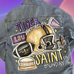 the back of a jean jacket with an image of a football helmet and other sports related items