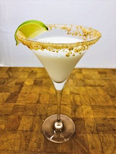 a margarita cocktail garnished with lime and sugar