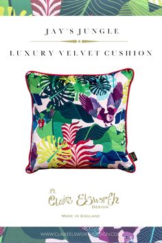 an advertisement for a luxury velvet cushion with tropical leaves and flowers in pink, green, blue