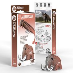 the mammoth toy is in its box next to it's packaging and instructions on how to use it